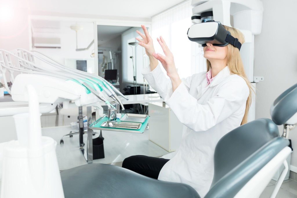Dentist using virtual reality technology in a modern dental clinic